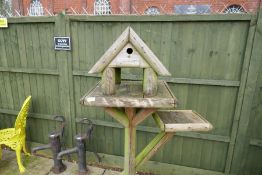 Large wooden freestanding covered bird table