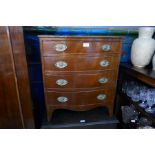 An old mahogany bow front chest having 4 drawers