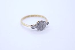 18ct and platinum Art Deco diamond set panel ring in the form of a flower, size P, marked 18ct and P