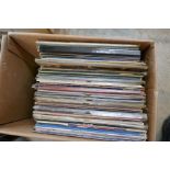A quantity of vintage vinyl LPs mainly easy listening, examples by Cliff Richard and Abba