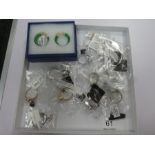 Tray of as new silver dress rings incl. Swarovski set, tanzanite, red jade. opal etc and two pairs o