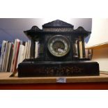 A French slate clock with Doric columns