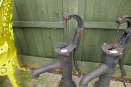 Heavy cast iron water pump embossed with the letter 'P'