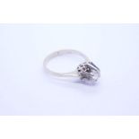 18ct white gold Solitaire diamond ring with raised approx 0.10 carat diamond in 6 claw mount, marked