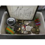Two World War II medals, military buttons, coins, and sundry