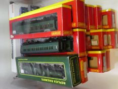 Seventeen boxed Hornby '00' gauge carriages with BR Green livery and others