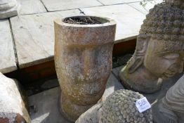 A garden pot in the form of an Easter Island Head