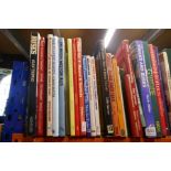 A collection of transportation books on mostly buses, trains, etc