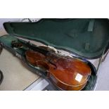 An antique violin, 14.5" the rear indistinctly stamped; London, cased