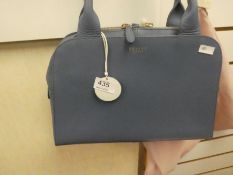 RADLEY; a blue leather handbag, complete with cloth outer cover