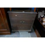 An antique mahogany converted commode having two drawers