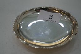 A Sterling WK trinket dish probably Wai Kee Hong Kong. The border is decorated with ornate rim. Also