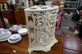 An old 'Coalbrookdale style' cast iron corner umbrella stand, height 56cm