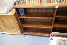 An early 20th Century, stained pine open bookcase, having gallery back, 152cm