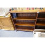 An early 20th Century, stained pine open bookcase, having gallery back, 152cm