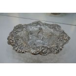 A very decorative pierced silver American fruit bowl having very ornate design of scrolls and floria