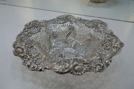 A very decorative pierced silver American fruit bowl having very ornate design of scrolls and floria