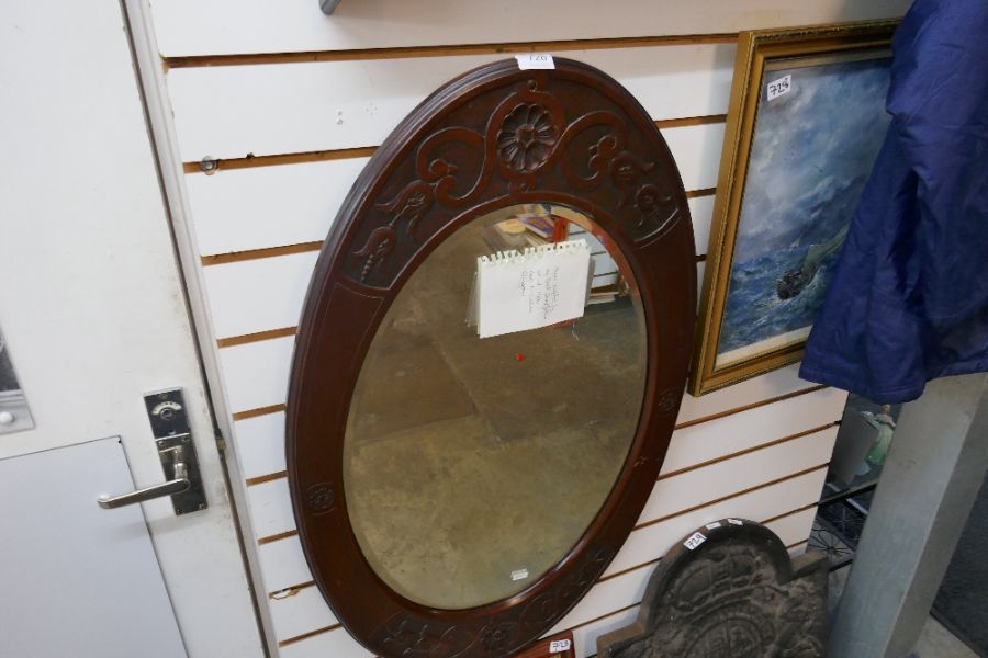 Mirror and two paintings depicting sailing ships