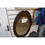 Mirror and two paintings depicting sailing ships