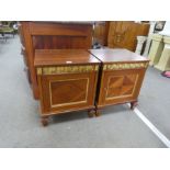 A pair of reproduction French style bedside cupboards