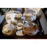 A box of Alfred Meakin dinner and tea ware with hunting scene designs