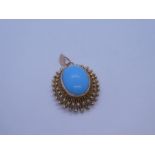 14ct yellow gold pendant with oval imitation turquoise in raised rubover setting and decorative 14K