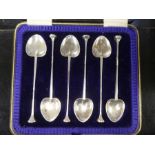 A cased set of six pretty silver coffee spoons, having a decorative love heart shaped bowl and seal