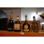 A bottle of Chivas Regal Whisky, 750 mls, and 3 other bottles of alcohol