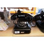 A Louis Schwabe vintage Bakerlite telephone and one other similar telephone