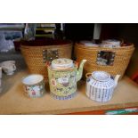 Three various Chinese teapots, with fitted wicker cases, and sundry