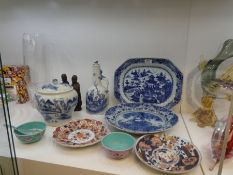 A 19th Century, Chinese blue and white lidded bottle, two Nankin chargers and other oriental items