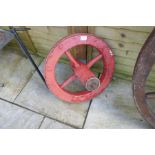 An iron bound wooden wheel, heavy