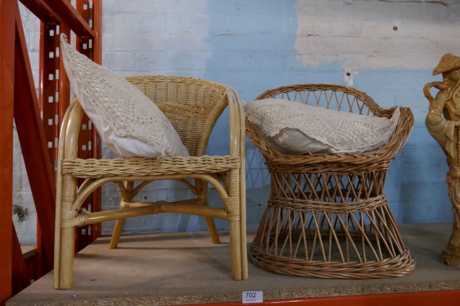 A wicker child's chair and one other cane example