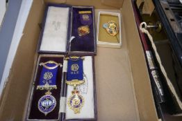 A 9ct gold medal for Brogden Lodge 2111, one other silver gilt example and two