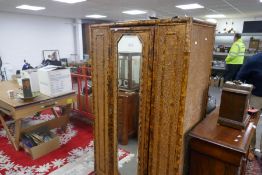 A Victorian bamboo single door wardrobe, with long drawer to base
