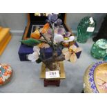 A modern oriental enamelled bowl on carved stand and an oriental miniature tree