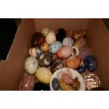 A small box of marble eggs and similar