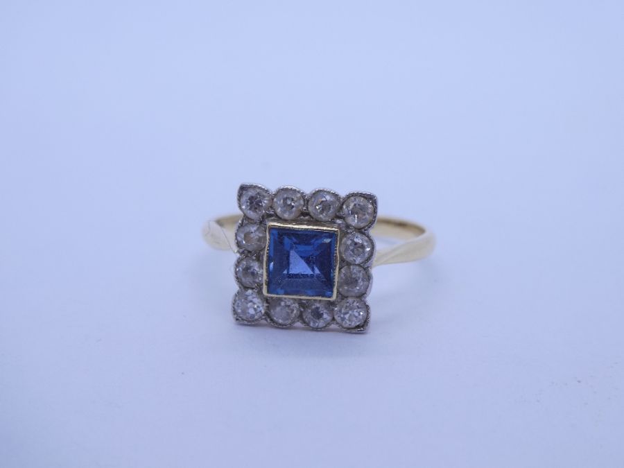 Art Deco Sapphire and diamond cluster ring with central square cut sapphire approx 0.4 carat, surrou