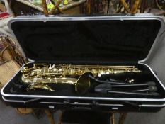 A Tenor Saxophone "The Horn" by Trevor J. James & Co., in a hard case