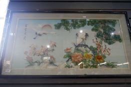Two similar Chinese panels having Mother of Pearl style decoration of Cranes and Peacocks, surrounde