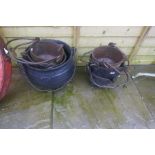 A quantity of cast iron pots with handles - all drilled for planting