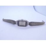 Art Deco platinum cased Prisma wristwatch with sapphire and diamond encrusted bezel marked Platinum,