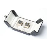 A cased pair of Sterling Silver BVLGARI dice having gilted number marks and engraved Bvlgari Las Veg