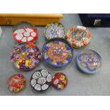 Nine Millefiori glass paperweights