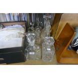 Eight various decanters and water jugs