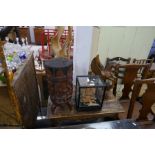 An oriental cork display in glazed case, an African drum carved figures and two other items