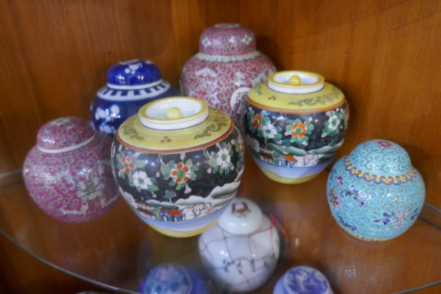 A quantity of oriental ginger jars and others, including a blue and white crackleware example