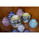 A quantity of oriental ginger jars and others, including a blue and white crackleware example