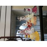 A quantity of Coalport and Royal Doulton figures of ladies (10)