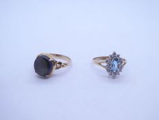 A 14K yellow gold dress ring set with a grey gemstone, together with a 9ct gold cubic zirconia set d